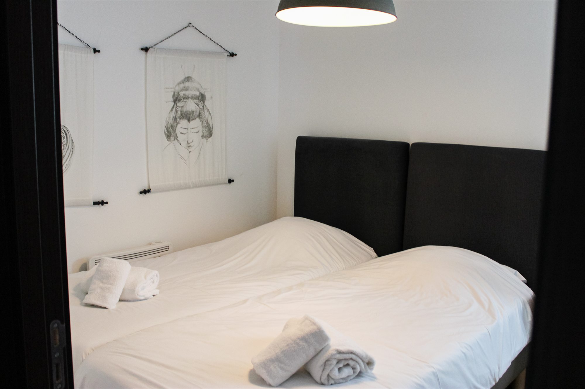 Appartement T3 — la seconde chambre avec deux lits simples